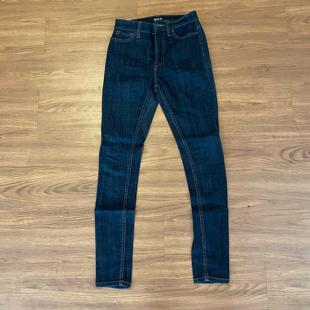 BDG dark blue super skinny jeans with red contrast stitching. Size 24.